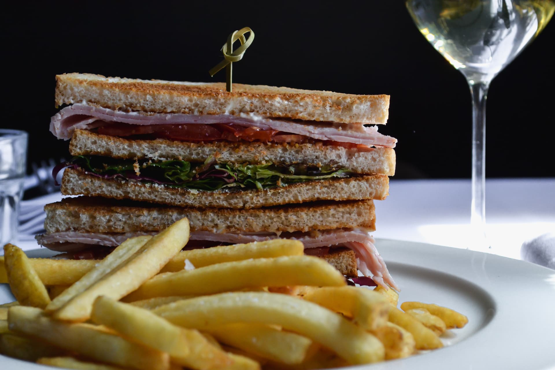 Club sandwich with fries